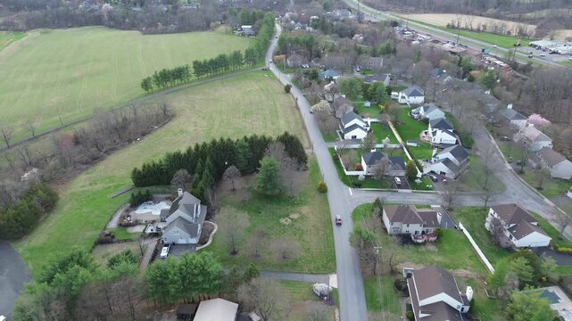 Open field residential fringe lies near Old York Rd, US 202 corridor within Readington Township. Rooflines, scattered trees, soft seasonal illumination surface contrast, Three Bridges, New Jersey