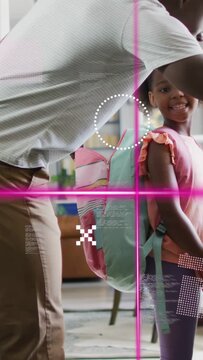 Vertical video: Dad reaching fixing straps pulling apple readying child for school icon pointing