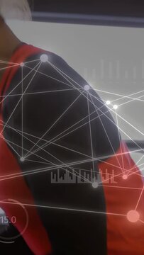 Vertical video: Camera revealing woman leaning forward in gym, overlay mapping movement for fitness