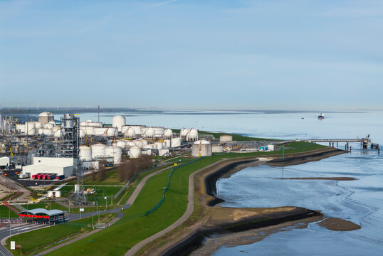 Aerial view of a petrochemical complex along the Westerschelde river