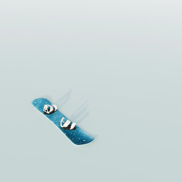3D rendering of a blue snowboard with white bindings and copy space