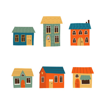 Cute hand drawn colorful houses set in flat Scandinavian style. Simple cozy homes illustration perfect for kids design, nursery decor, prints, posters, fabric, stickers and creative projects.