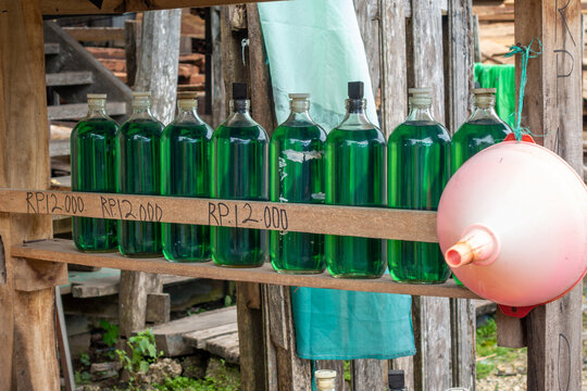 Bottled gasoline for sale along roads in Sulawesi, Indonesia