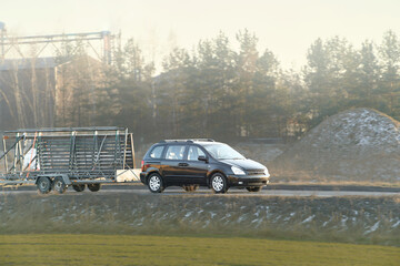 Fototapeta premium Highway vehicle with covered cargo trailer
