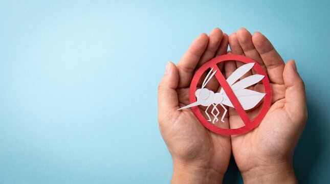 Cupped hands holding a red circular stop sign with a white mosquito crossed out, symbolizing pest control and disease prevention.