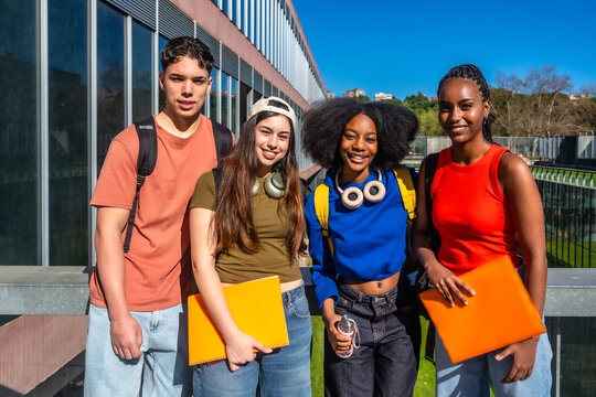 Diverse students smiling gathering on university campus