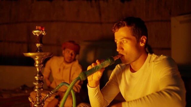 Tourist Smoking Hookah with Bedouin in Rub' al Khali Desert, Cinematic Cultural Exchange in Empty Quarter Oman