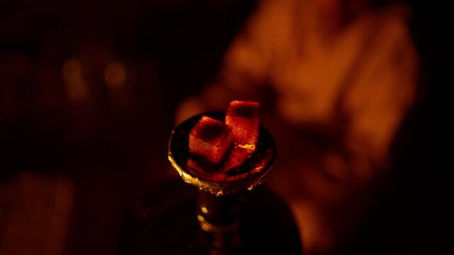 Top-Down Shot of Glowing Hookah Charcoal in Rub' al Khali, Cinematic Shisha Embers in Omani Desert