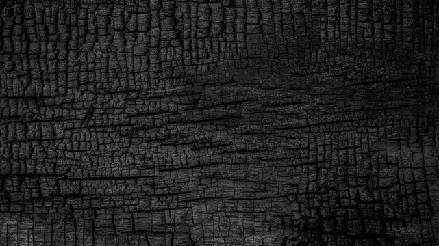 BBQ background. Burnt wooden Board texture. Burned scratched hardwood surface. Smoking wood background. Burned wooden grunge texture
