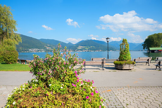pictorial park lakeside Bad Wiessee, with flower pots and benches, bavarian alps view