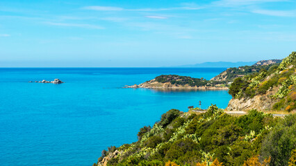 Obraz premium Panoramic view of seaside road on Sardegna island, Italy