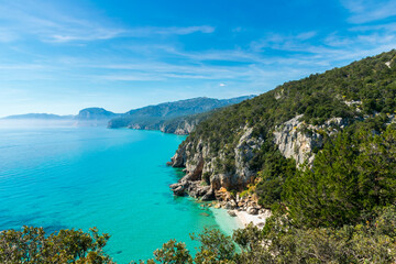 Obraz premium Early morning panorama of Spiaggia di Cala Fuili with Golfo di Orosei in the background, Sardegna, Italy