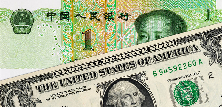 1 United States dollar and 1 Chinese yuan. USA vs China.