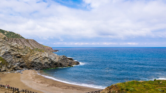 Panoramic view of Spiaggia Piccola beach in Argentiera abandoned mining town, Sardinia Island, Italy