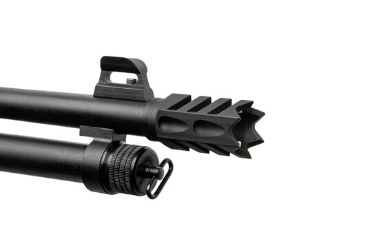 Close-up of a shotgun muzzle brake and front sight isolated on a white back