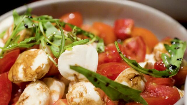 Fresh Caprese Salad with Mozzarella Cheese and Cherry Tomatoes at Buffet