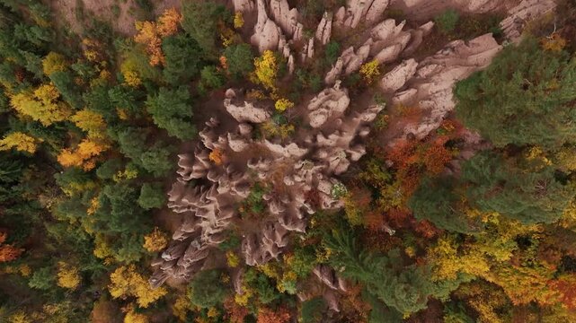 Top wiev of Earth pyramids of Platten at daytime, aerial view, at autumn season time