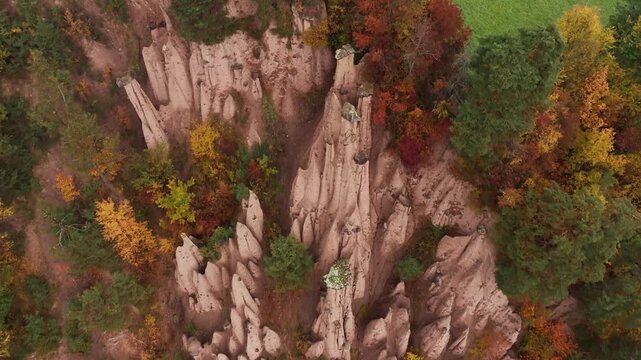 Earth pyramids of Platten at daytime, aerial view, at autumn season time.