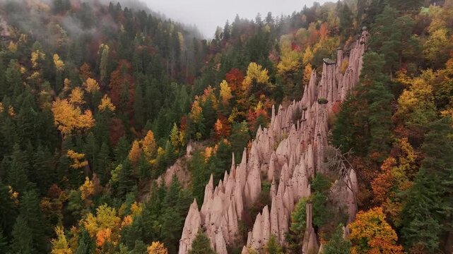 Earth pyramids of Platten at daytime, aerial view, at autumn season time.