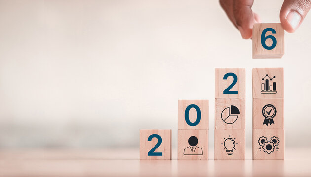 Businessman plan strategy marketing and finance to goal in 2026 planning business growth with technology AI and environmental care to New Year resolutions business.