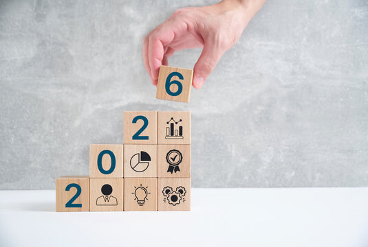 Businessman plan strategy marketing and finance to goal in 2026 planning business growth with technology AI and environmental care to New Year resolutions business.