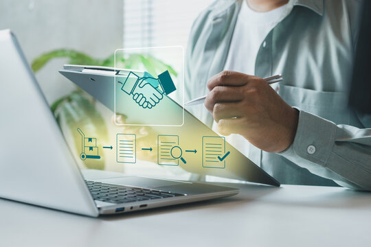 Procurement process management, Digital and paper document approval, contract verification, supplier negotiation, and business purchasing operations using laptop and paper in office environment