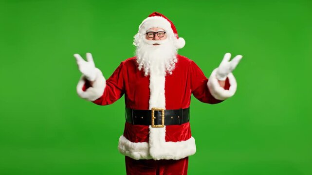 Santa Claus in his iconic red suit and white beard, gesturing with open arms on a chroma key background, perfect for festive projects.