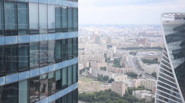 Moscow, Russia. - June 13, 2025: View of the city from the high floor of one of the elevators in the Moscow City business center. City streets