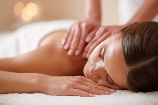 Close Up Detailed Shot of a Woman Receiving a Relaxing Swedish Massage on Her Back