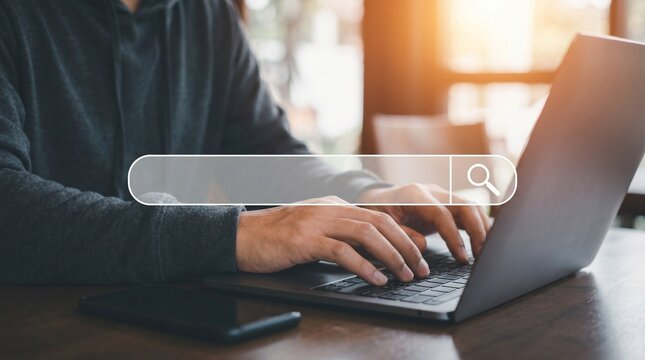 Man working on laptop with search bar overlay browse internet website information and networking in office professional businessman typing on keyboard digital marketing technology SEO concept