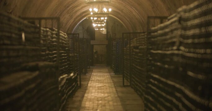 Antique beverage passage. Historical wine corridor featuring warm and radiant setting. Classic cellar passageway filled with vintage wines and softly glowing environment