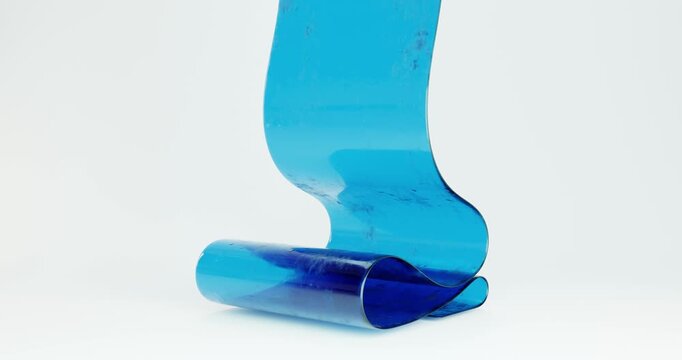 3d gel-like roll of saturated blue color. The gel multilayer structure is translucent, with a soft glossy sheen. The material looks elastic and dense, resembling cooling inserts, ballistic gel, or mod