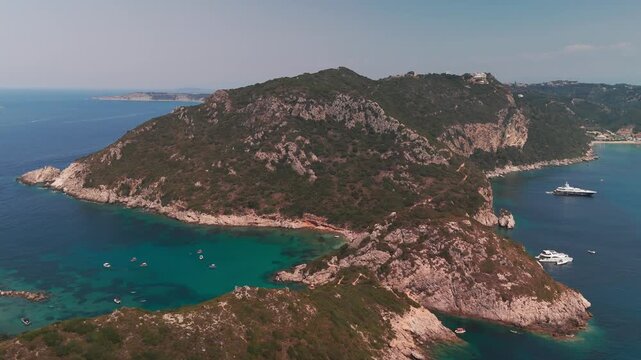 Low Altitude Drone Flight Over Crystal Waters and White Sands of Porto Timoni Beach