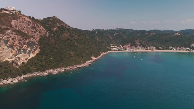 Panoramic Aerial Pan of Agios Georgios Pagon Bay and Turquoise Waters in Corfu Greece