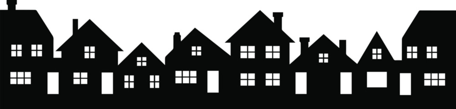 Neighborhood skyline formed by house rooflines and chimneys