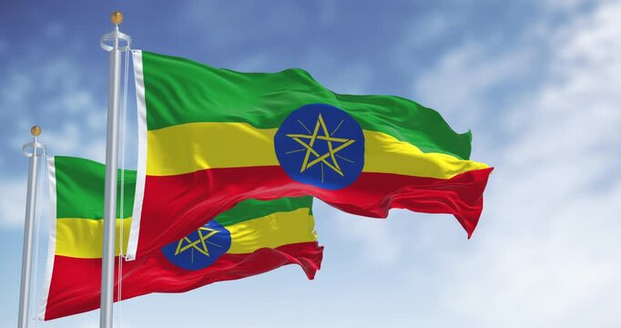 Ethiopia national flags waving on a clear day. Seamless 3d render animation. Slow motion loop. Selective focus