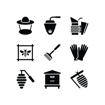 Black of beekeeping equipment and tools on white background, hive smoker gloves