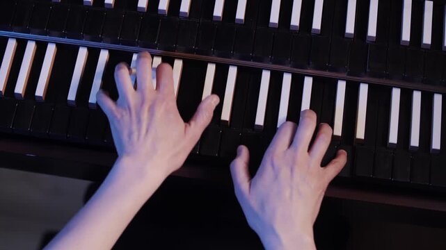 First Person View of Pianist Hands Playing Harpsichord Piano Keyboard