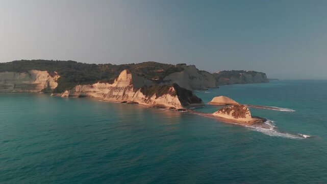 Wide Scenic Aerial Pullback Revealing Cape Drastis Peninsula and White Cliffs in Corfu Greece