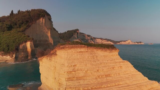 Aerial Drone Rise Over Esperii Rock Revealing Cape Drastis Coastline Panorama