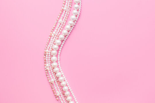 Natural white pearls - beads for jewelry, top view. Precious and elegance concept background