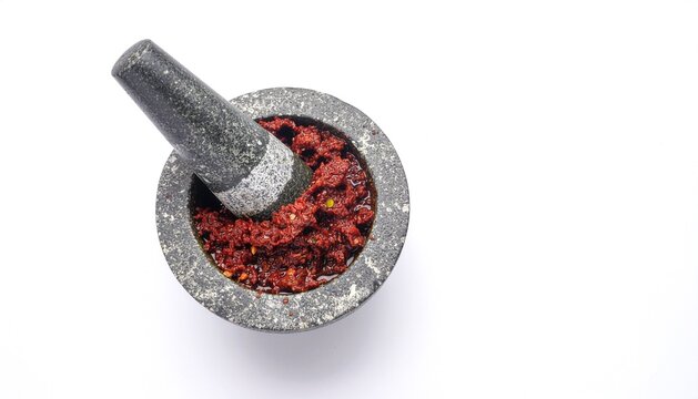 Indonesian Sambal Terasi in Stone Mortar, Minimalist Culinary Focus