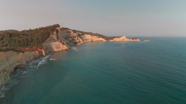 Aerial Drone Approach to Cape Drastis Coastal Cliffs and Turquoise Waters in Sidari Corfu