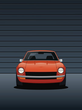 Orange sports car shown from the front in a dark modern garage with dramatic lighting