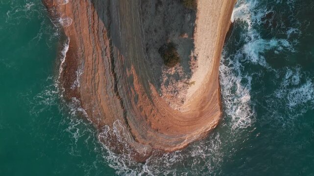 Top Down Aerial Rise Over Cape Drastis White Rock Formations at Sunrise Corfu Greece