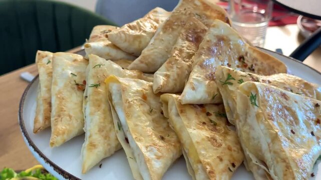 Crispy meat pastries, Home cooked cheburek pastries with meat and cheese filling, Traditional style fried chebureks showcasing crispy dough and savory interior flavors