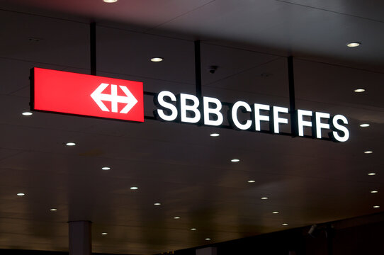 Illuminated SBB CFF FFS (Swiss Federal Railways company) sign at train station in Lugano, Switzerland