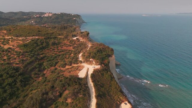 High Altitude Aerial Over Cape Drastis Chalk Cliffs Edge and Deep Blue Ionian Sea