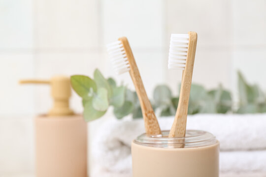 Holder with wooden toothbrushes, closeup