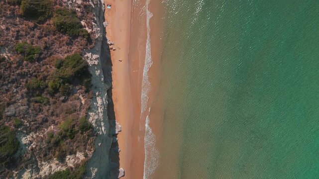 Top Down Aerial Flight Over Arillas Beach Golden Sand and Turquoise Sea in Corfu